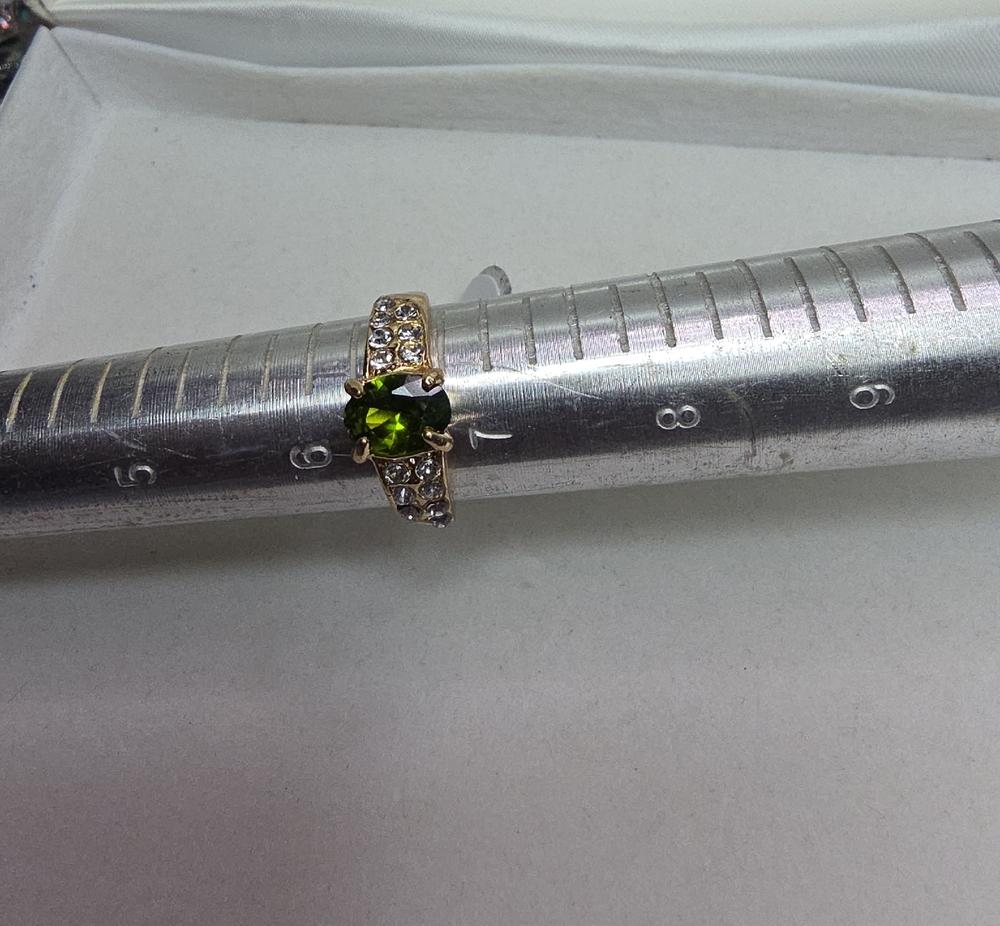 Gold Tone Women's Ring with Green Gemstone and Clear Accents
